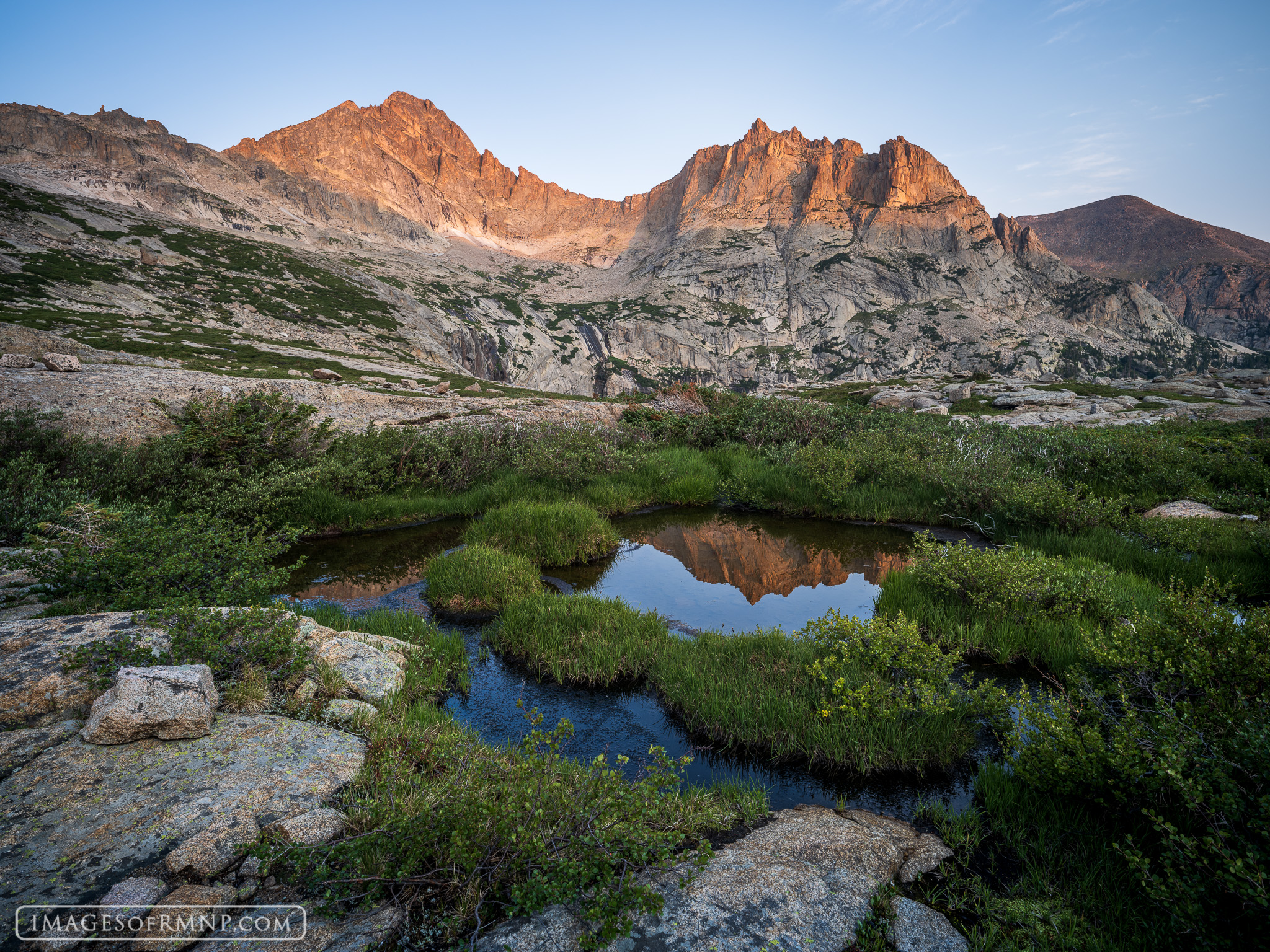 On a perfectly still August morning, the mountains bathed in the warm morning light as the tarns scattered throughout this high...